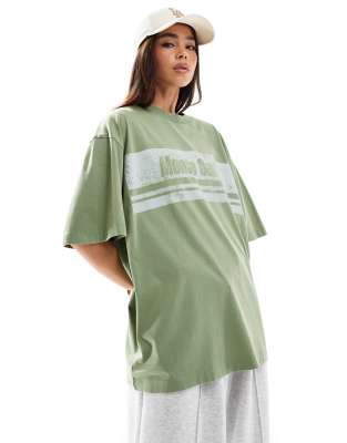 ASOS DESIGN - Oversize-T-Shirt in verwaschenem Grün mit „Monte Carlo"-Grafikprint