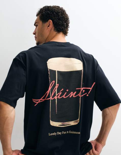 ASOS DESIGN oversize t-shirt med Guinness-tryck i svart - view 1