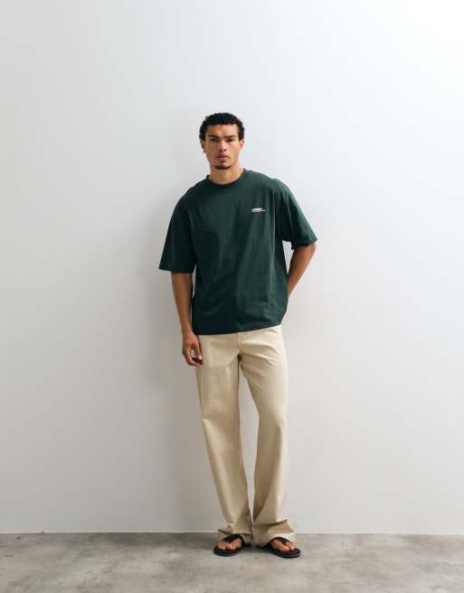 ASOS DESIGN Oversize-T-Shirt mit Brustgrafik in Dunkelgrün, 3 von 5