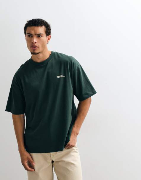 ASOS DESIGN oversize T-shirt z nadrukiem na piersi w ciemnozielonym kolorze - view 1