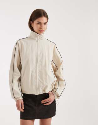 ASOS DESIGN - Oversize-Trainingsjacke in Creme mit brauner Paspelierung-Neutral