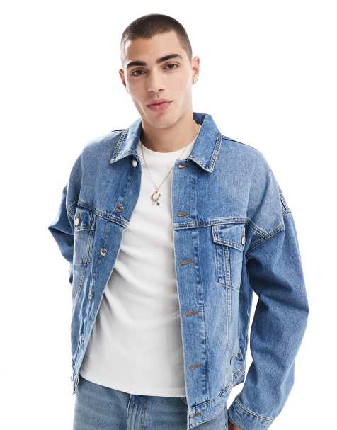 ASOS DESIGN – Oversize-Truckerjacke in verwaschenem Mittelblau - view 1