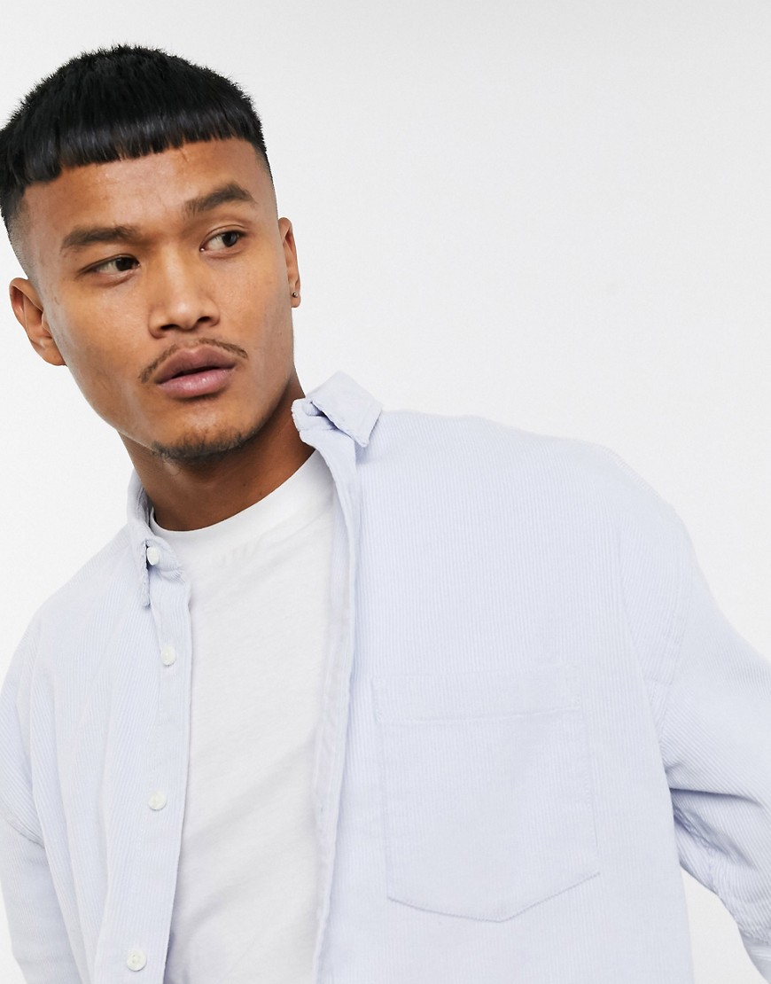 ASOS DESIGN oversized 90's style cord shirt in blue