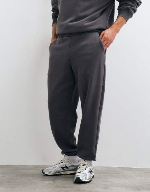 ASOS DESIGN oversized acid wash cuffed jogger in charcoal, 2 of 5