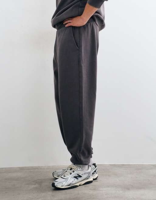 ASOS DESIGN oversized acid wash cuffed jogger in charcoal, 4 of 5
