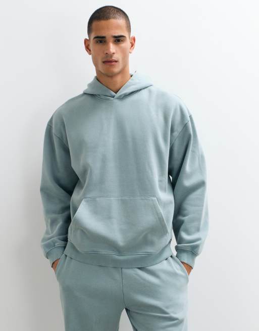 ASOS DESIGN  co-ord oversized acid wash hoodie and jogger in teal, 2 of 3