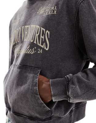 ASOS DESIGN oversized acid wash hoodie with front chest print in gray