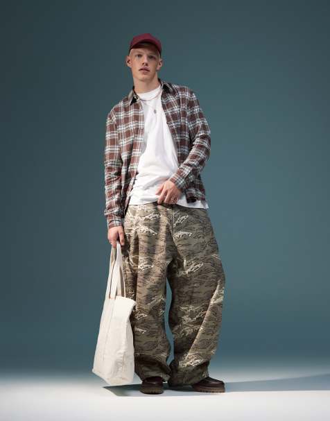 ASOS DESIGN oversized baggy camo print trousers  - view 1