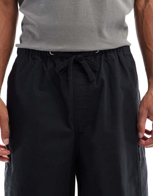 ASOS DESIGN oversized baggy cargo pants in black ripstop, 4 of 5