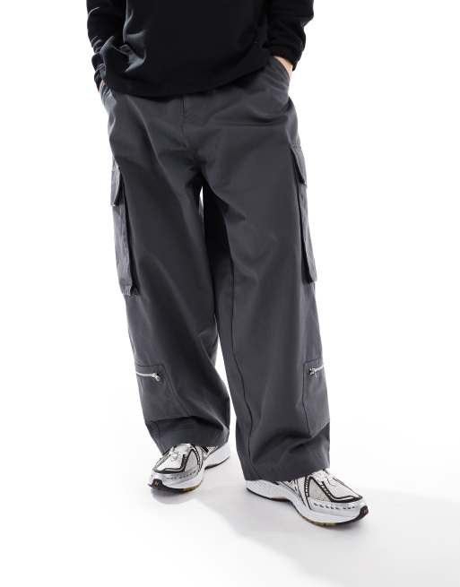 ASOS DESIGN oversized baggy cargo pants with zip details in charcoal, 3 of 5