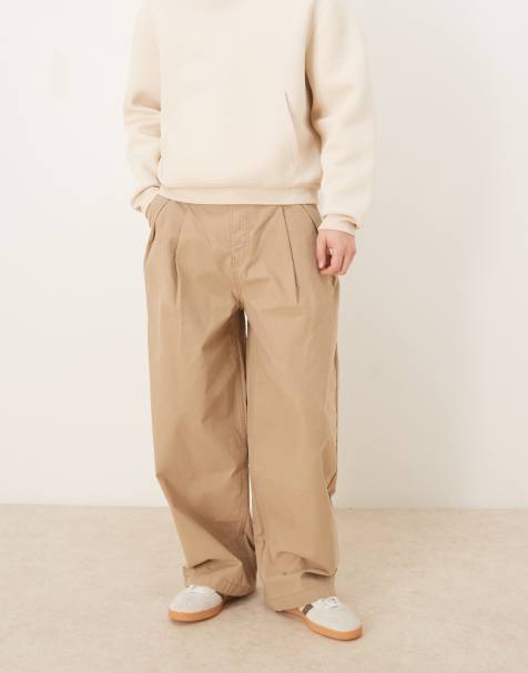 ASOS DESIGN oversized baggy chinos in beige with pleats - view 1