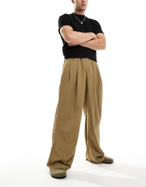 ASOS DESIGN oversized baggy chinos with pleats in khaki  - view 1