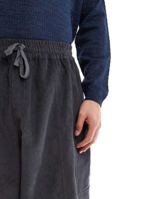 ASOS DESIGN oversized balloon cord pants in charcoal with side pockets