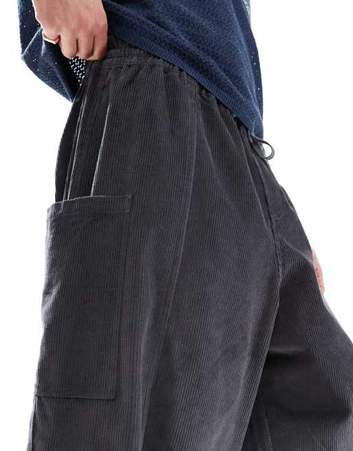 ASOS DESIGN oversized balloon cord pants in charcoal with side pockets