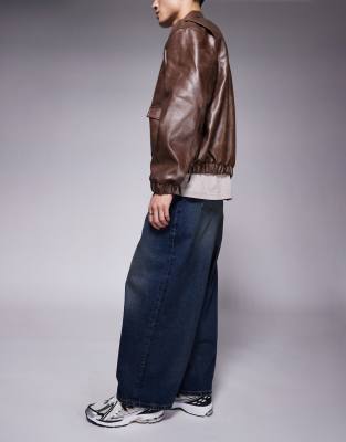 ASOS DESIGN oversized baggy fit jeans with vintage tint in dark wash blue