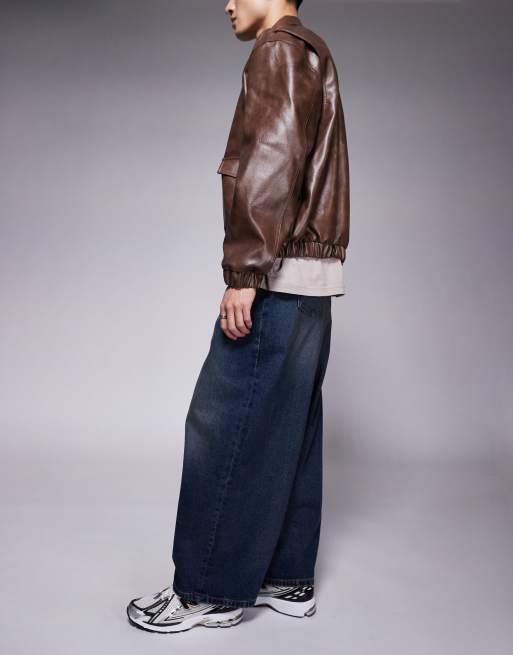 ASOS DESIGN oversized baggy fit jeans with vintage tint in dark wash blue 