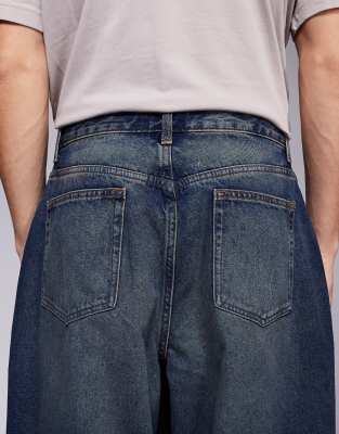 ASOS DESIGN oversized baggy fit jeans with vintage tint in dark wash blue