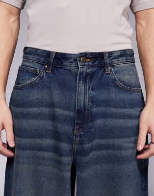 ASOS DESIGN oversized baggy fit jeans with vintage tint in dark wash blue