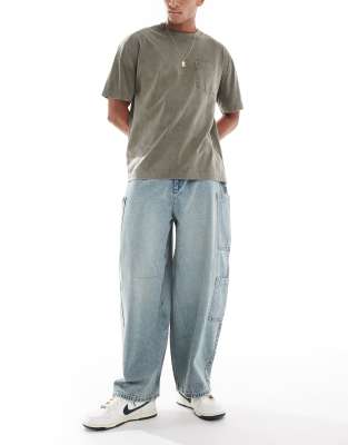 ASOS DESIGN oversized baggy jeans in bleach wash with tint and cargo pockets-Blue