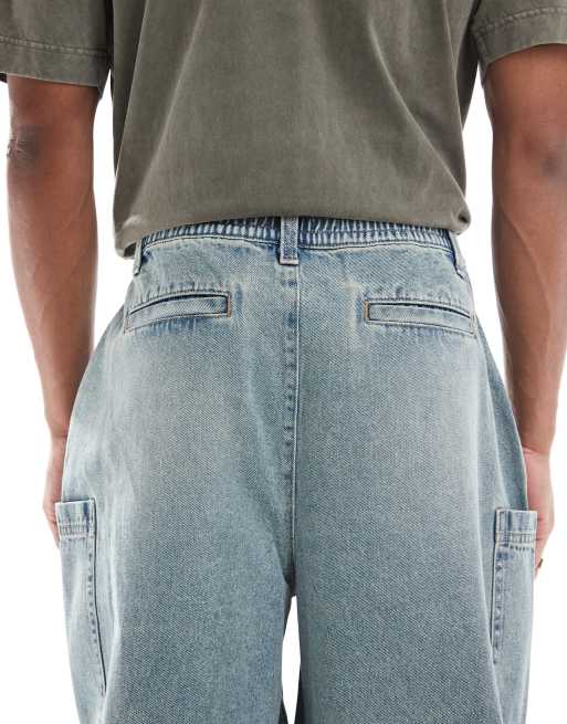 ASOS DESIGN oversized baggy jeans in bleach wash with tint and cargo pockets
