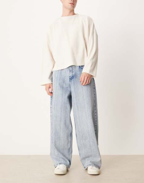ASOS DESIGN oversized baggy jeans in mid wash blue with stripe print - view 1