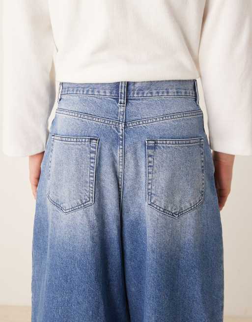 ASOS DESIGN - Oversized baggy jeans met geplooide zakken in mid-wash blauw, 4 van 5