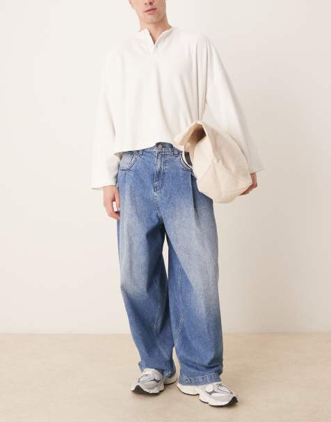 ASOS DESIGN oversized baggy jeans with pocket pleats in mid wash blue - view 1