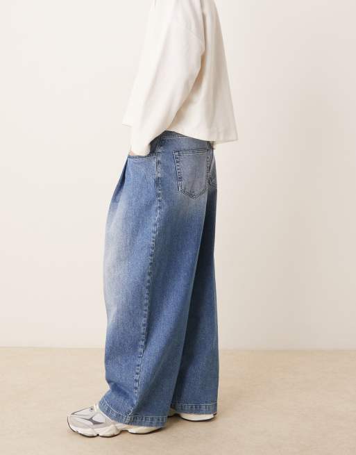 ASOS DESIGN oversized baggy jeans with pocket pleats in mid wash blue