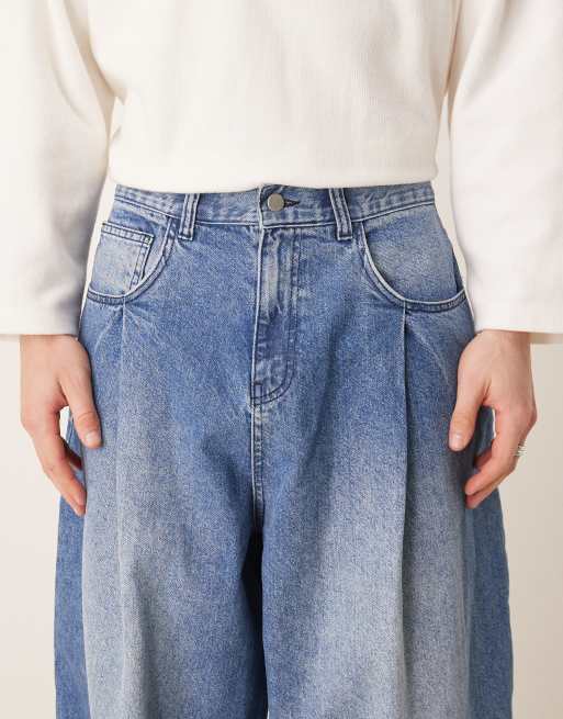 ASOS DESIGN oversized baggy jeans with pocket pleats in mid wash blue