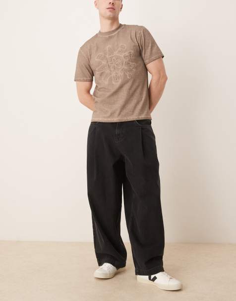 ASOS DESIGN oversized baggy jeans with pocket pleats in washed black - view 1