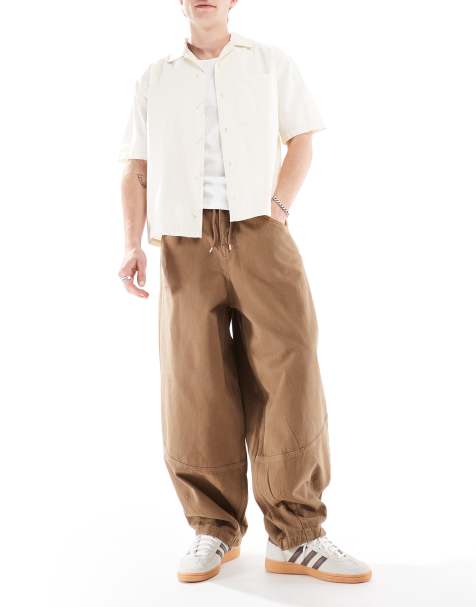 ASOS DESIGN oversized baggy pants with seam detail in brown - view 1