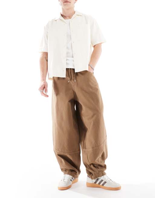 ASOS DESIGN oversized baggy pants with seam detail in khaki