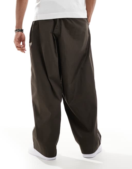 ASOS DESIGN oversized baggy pants with side piping in brown 