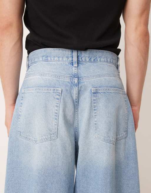 ASOS DESIGN oversized baggy pleated jeans in light wash brown