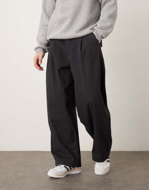 ASOS DESIGN oversized baggy trousers in black with pleats