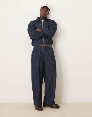 oversized balloon jeans in mid wash blue with stripe