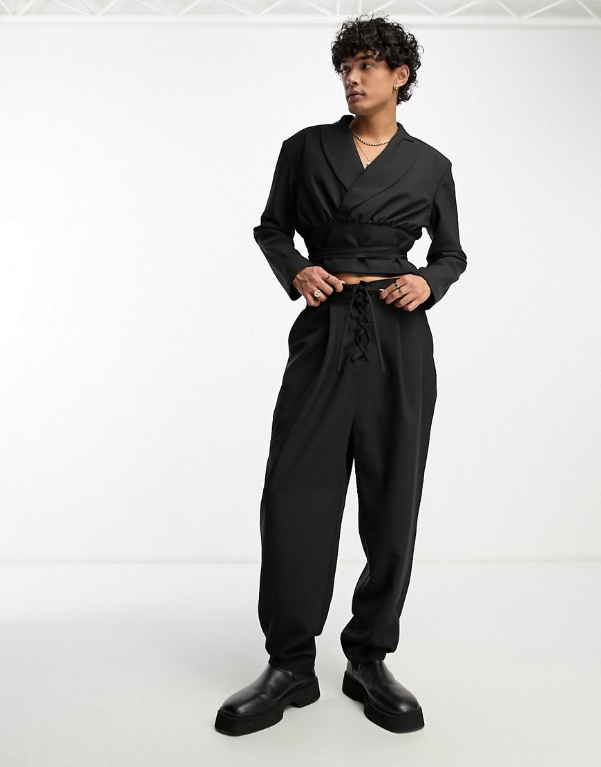 ASOS DESIGN oversized balloon lace up suit trousers in black