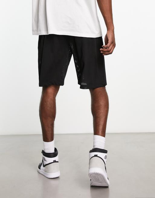 ASOS DESIGN oversized basketball shorts in black sporty mesh