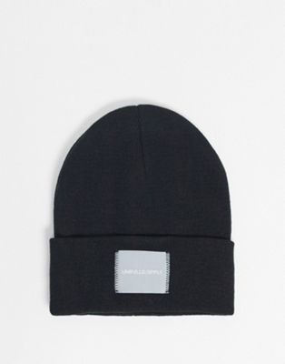 ASOS DESIGN oversized beanie in black with woven label - ASOS Price Checker