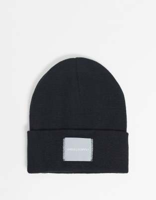 ASOS DESIGN oversized beanie in black with woven label | ASOS