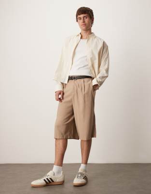 asos ASOS DESIGN oversized bemuda shorts with pleat details in sand