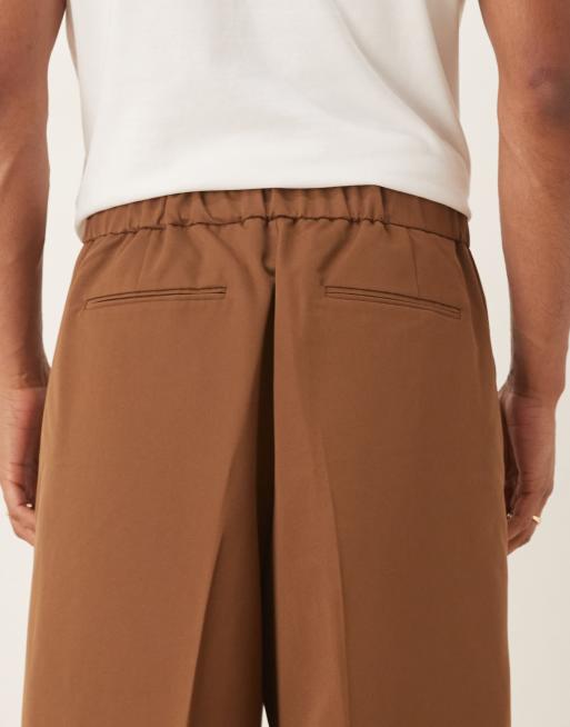 ASOS DESIGN oversized bermuda dressy shorts in brown with elastic waist - part of a set