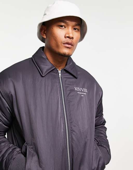 ASOS DESIGN oversized bomber jacket in navy with print