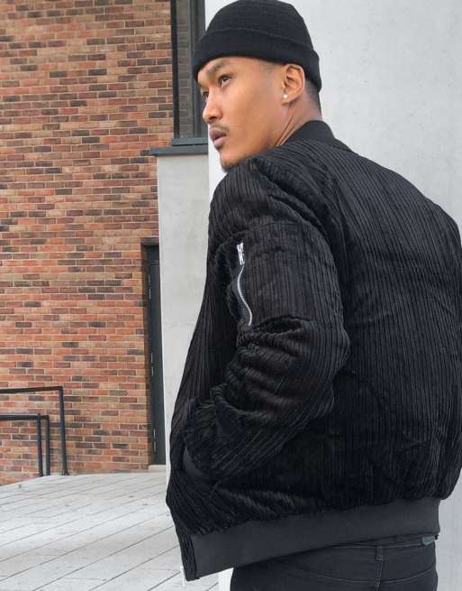 ASOS DESIGN oversized bomber jacket with MA1 pocket in black corduroy