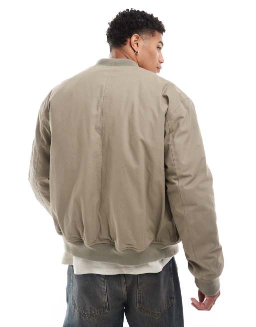 ASOS DESIGN oversized bomber jacket with pockets in brown ASOS