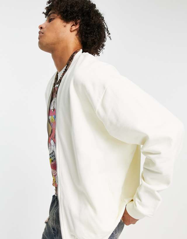 ASOS DESIGN oversized bomber jersey jacket in cream