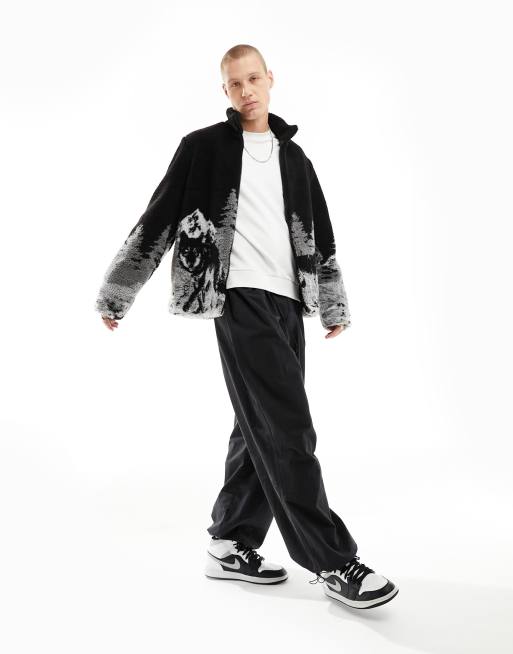 ASOS DESIGN oversized borg jacket with scenic print in black