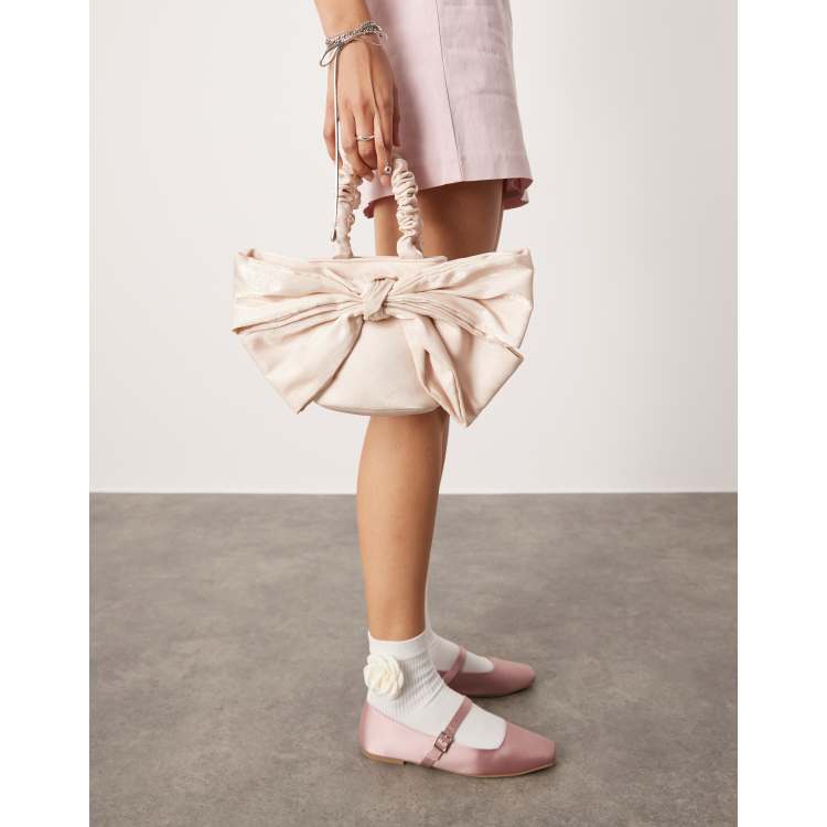 Pink bow suitcase online