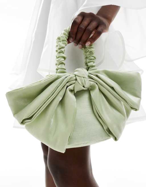 ASOS DESIGN oversized bow grab clutch bag in sage green | ASOS