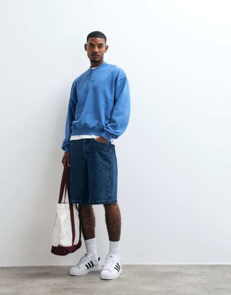 ASOS DESIGN oversized boxy concealed henley with acid wash in delft - view 1